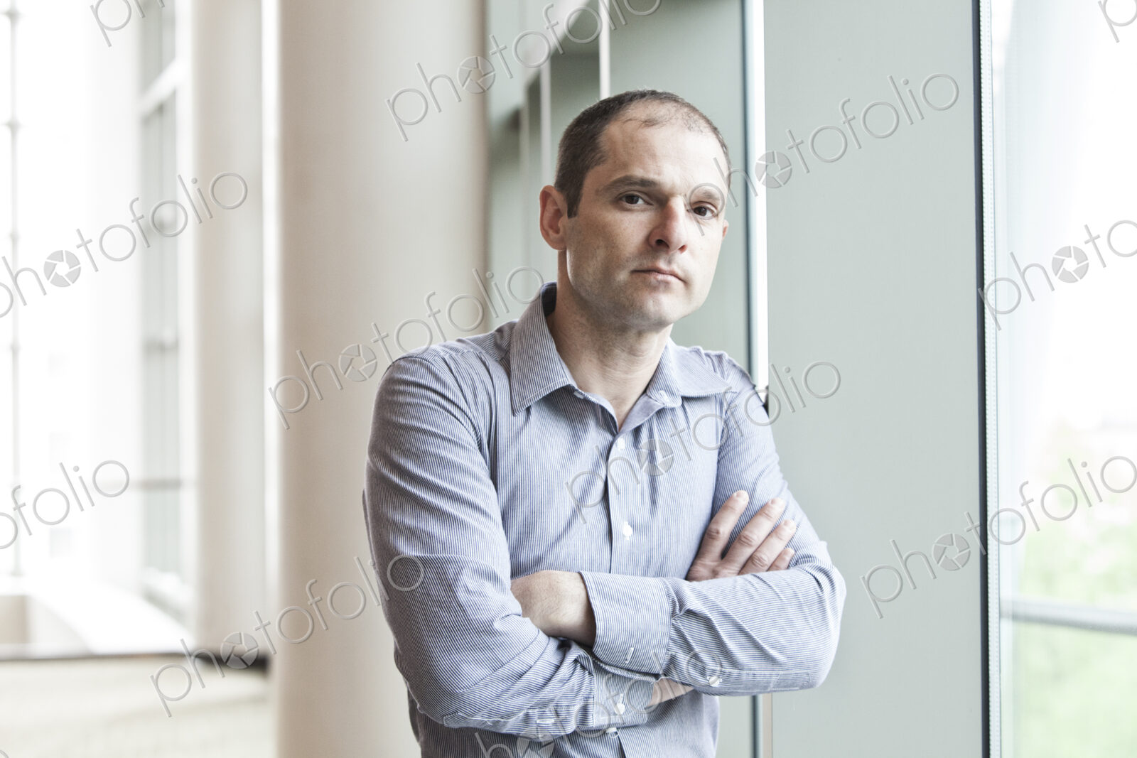 Caucasian businessman in a business center lobby.