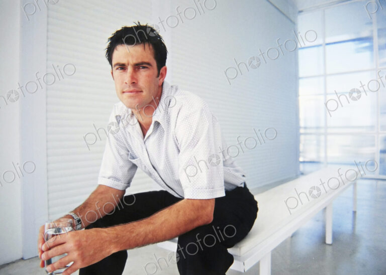Caucasian businessman sitting in office