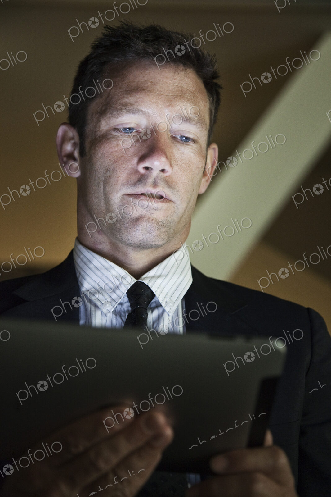 Caucasian businessman working on his notebook computer