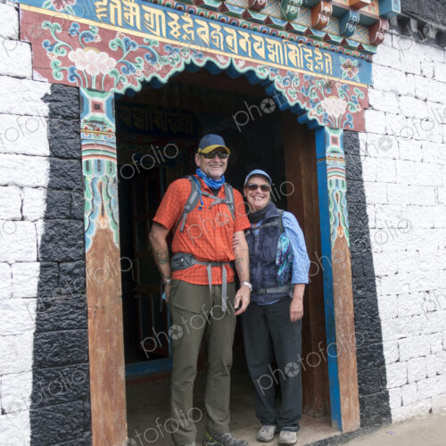 Caucasian couple standing in ornate doorway Caucasian couple standing in ornate doorway