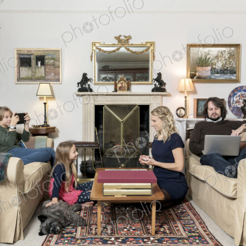 Caucasian family in living room Caucasian family in living room