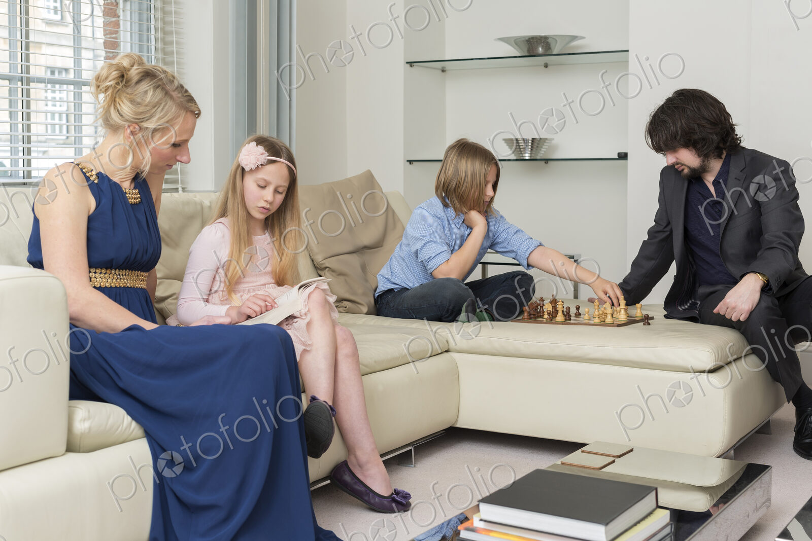 Caucasian family relaxing in living room