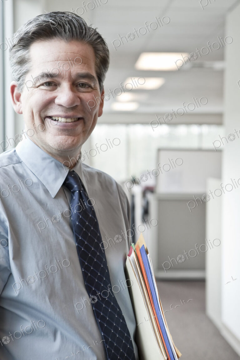 Caucasian man executive in office hallway