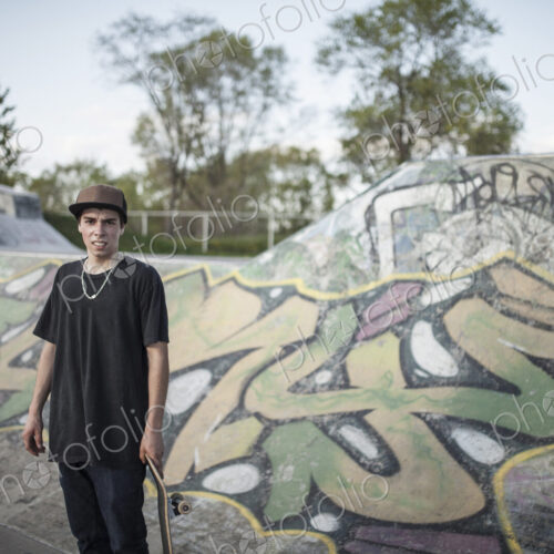 Caucasian man standing at skate park Caucasian man standing at skate park