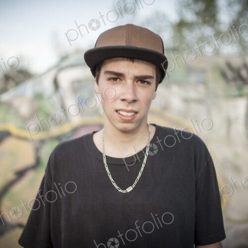 Caucasian man standing at skate park Caucasian man standing at skate park