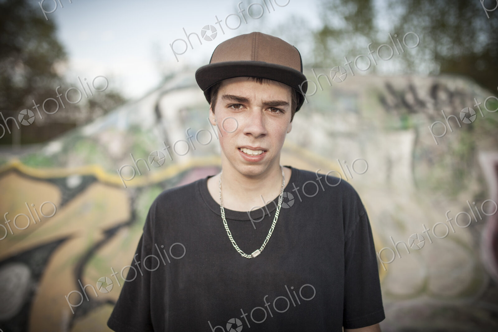 Caucasian man standing at skate park