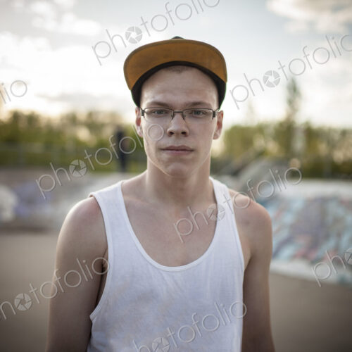 Caucasian man standing at skate park Caucasian man standing at skate park
