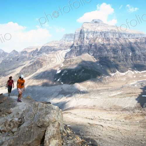 Caucasian mother and daughter hiking on Six Glaciers Trail, Banff, Alberta, Canada