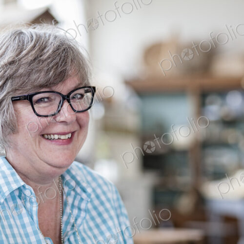Caucasian woman in an antique store.