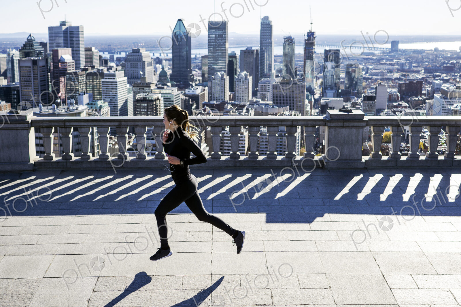 Caucasian woman running in city