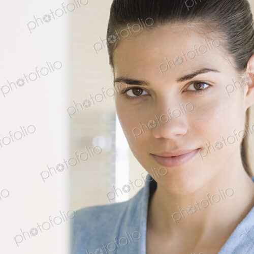 Caucasian woman wearing bathrobe