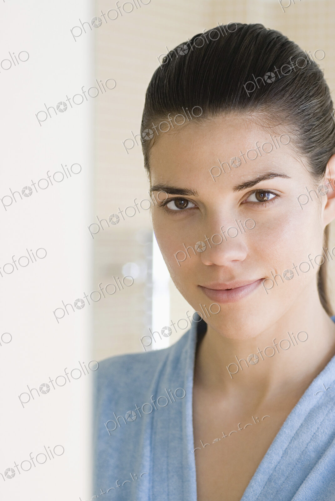 Caucasian woman wearing bathrobe