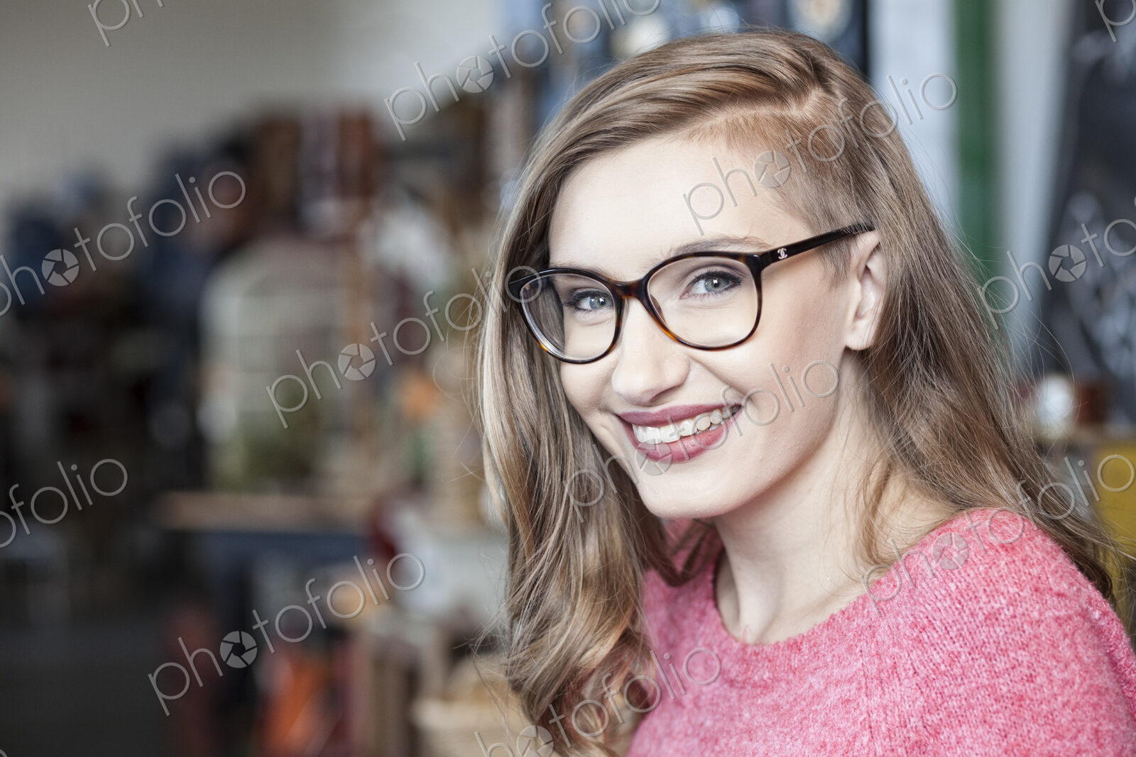 Caucasian woman working at an antique store