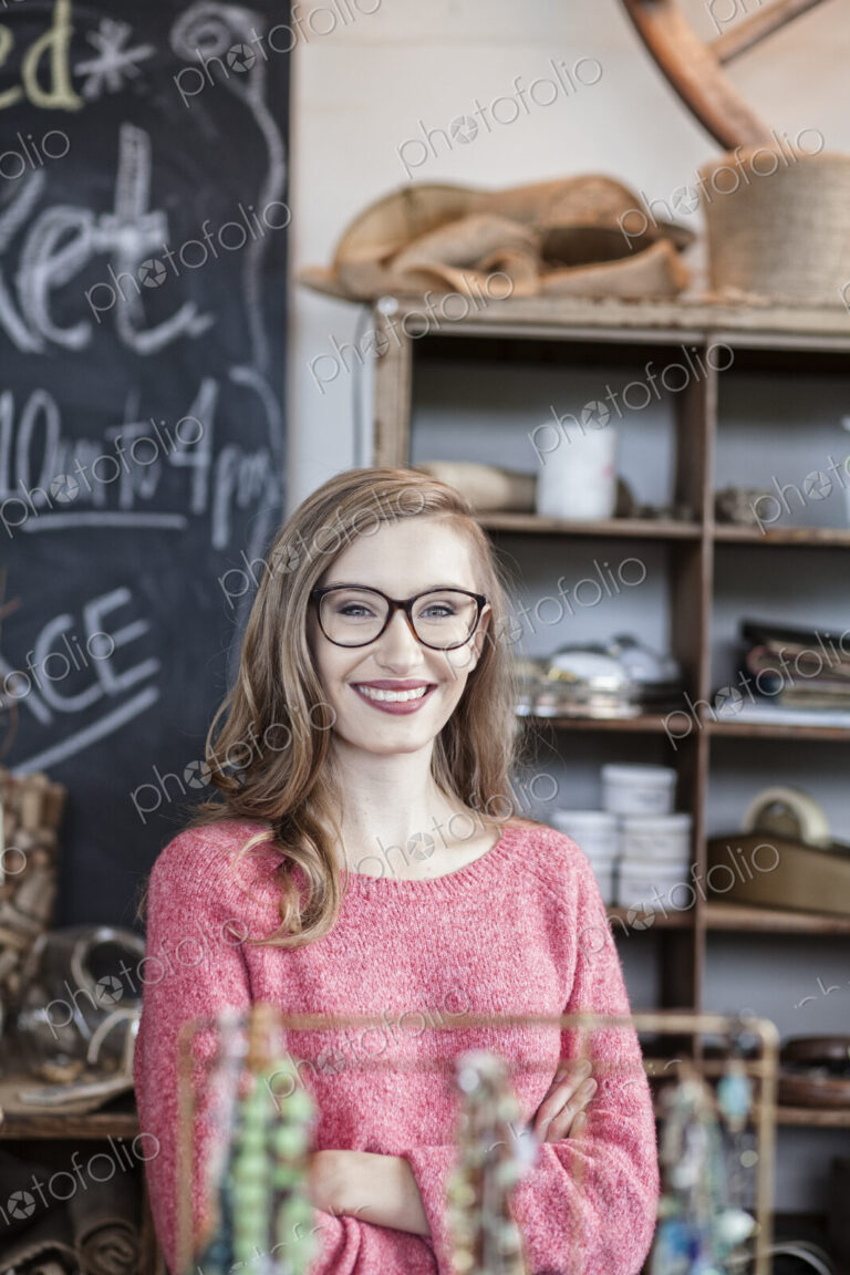 Caucasian woman working at an antique store