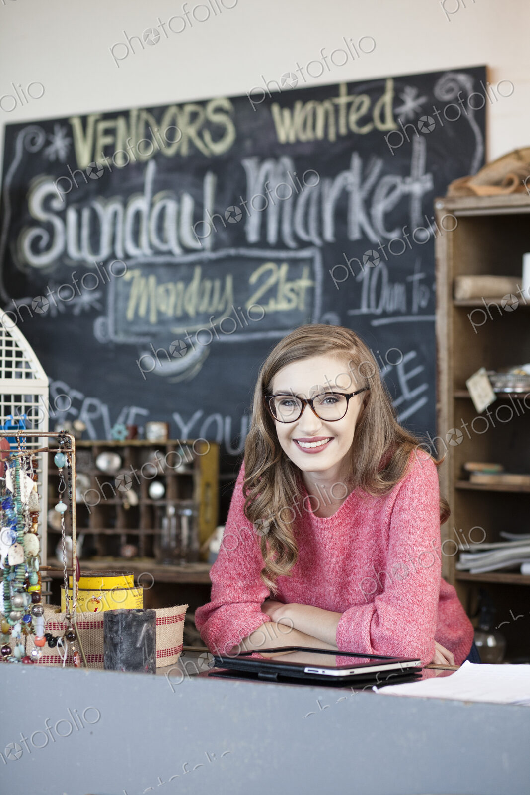 Caucasian woman working at an antique store