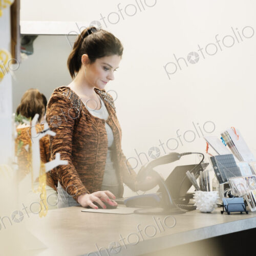 Caucasian woman working in store Caucasian woman working in store