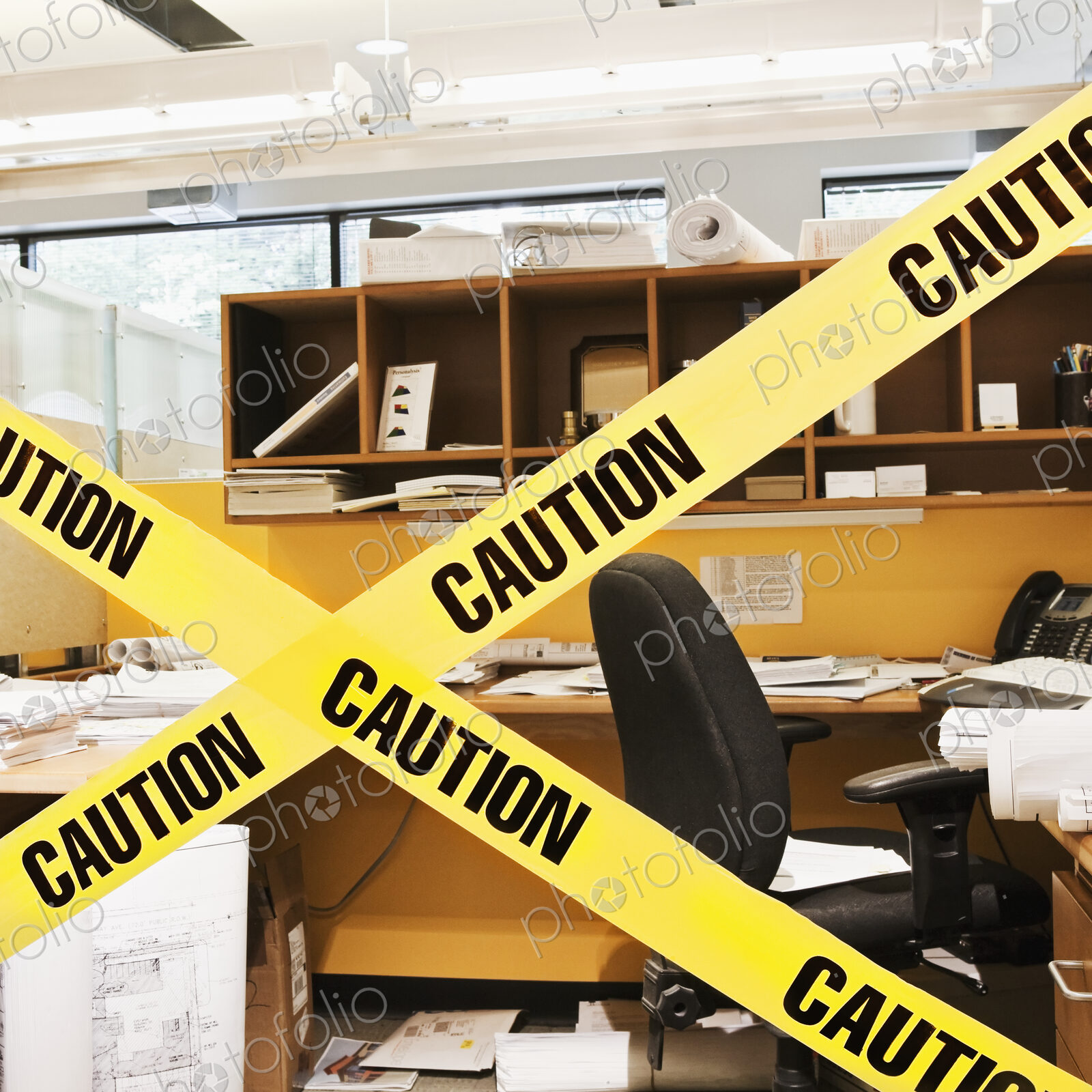 Caution Tape Blocking a Cubicle Entrance