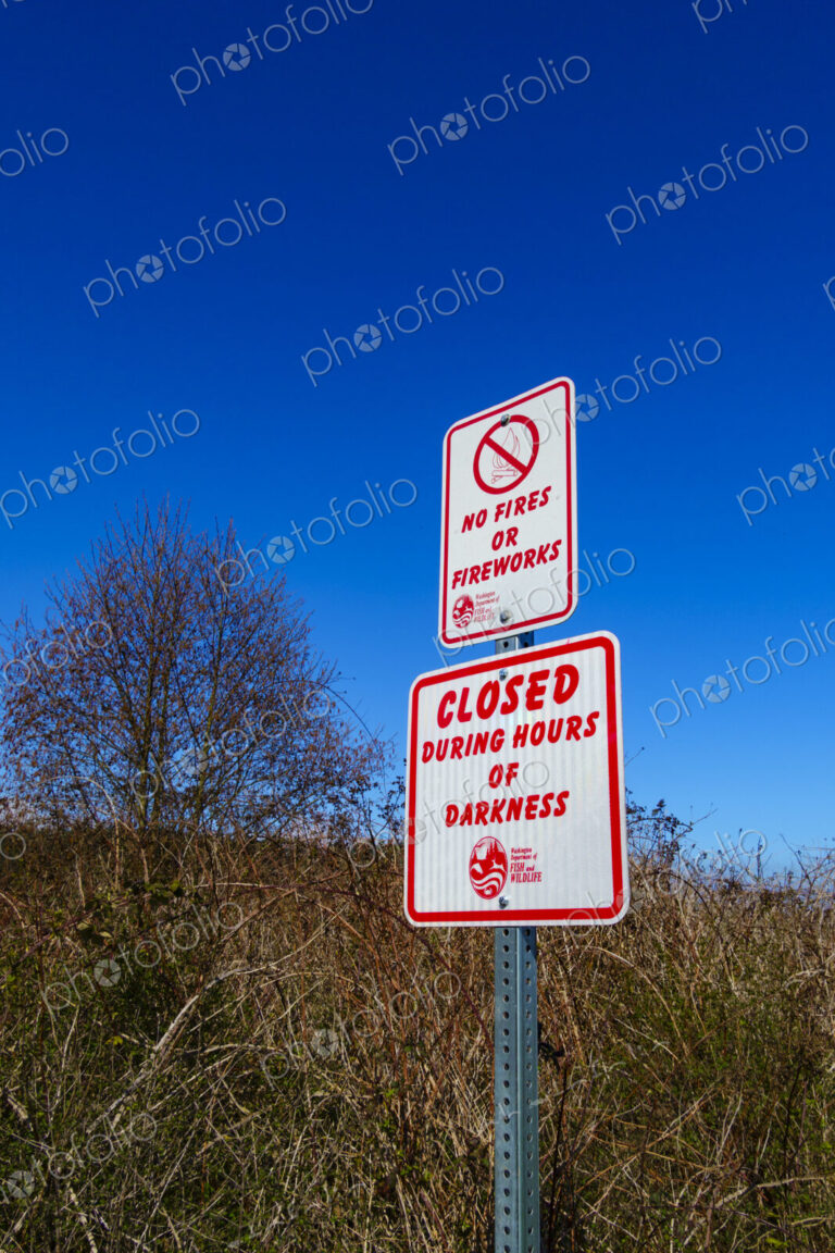 Caution and regulations signs in public park, Port Hadlock, WA USA