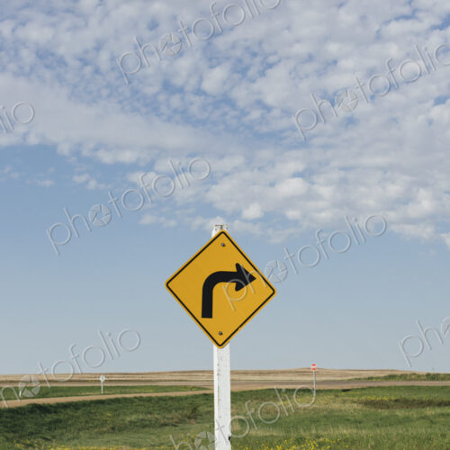 Caution turn ahead sign, near Scotsguard, Saskatchewan, Canada.