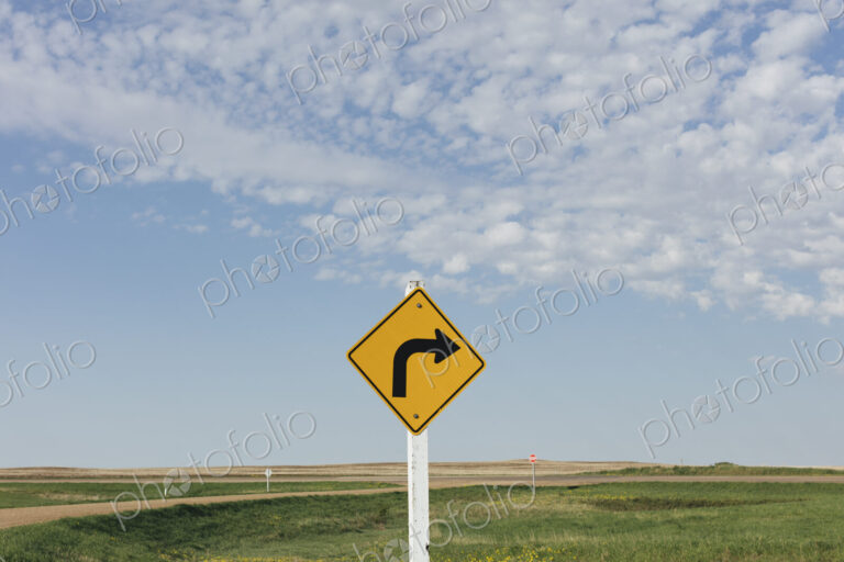 Caution turn ahead sign, near Scotsguard, Saskatchewan, Canada.