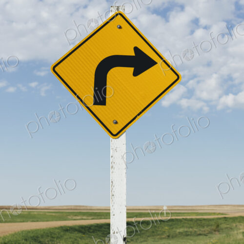 Caution turn ahead sign, near Scotsguard, Saskatchewan, Canada.