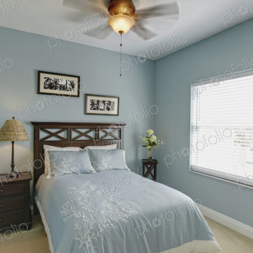Ceiling fan over bed in bedroom Ceiling fan over bed in bedroom