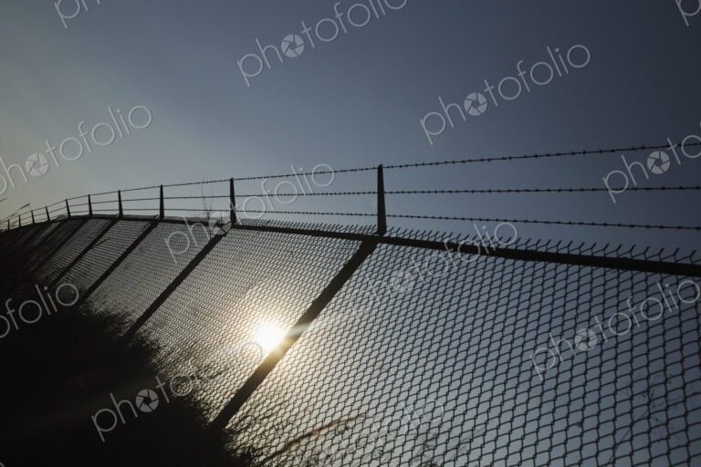 Chain Link and Barbed Wire Fence