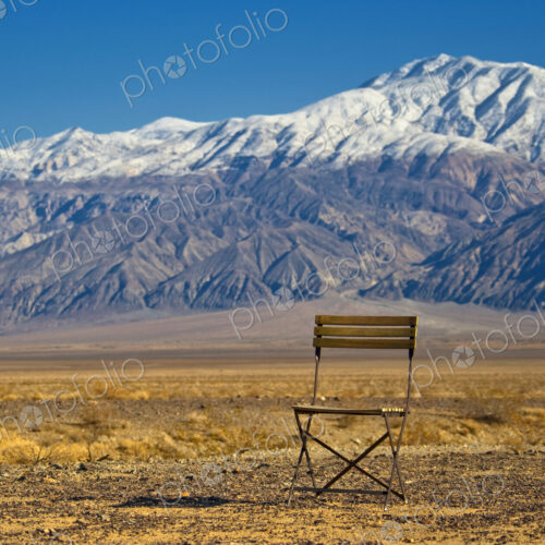 Chair in Mountainous, Desert Landscape