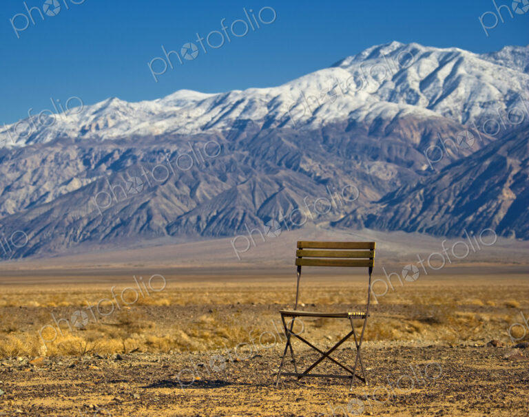 Chair in Mountainous, Desert Landscape