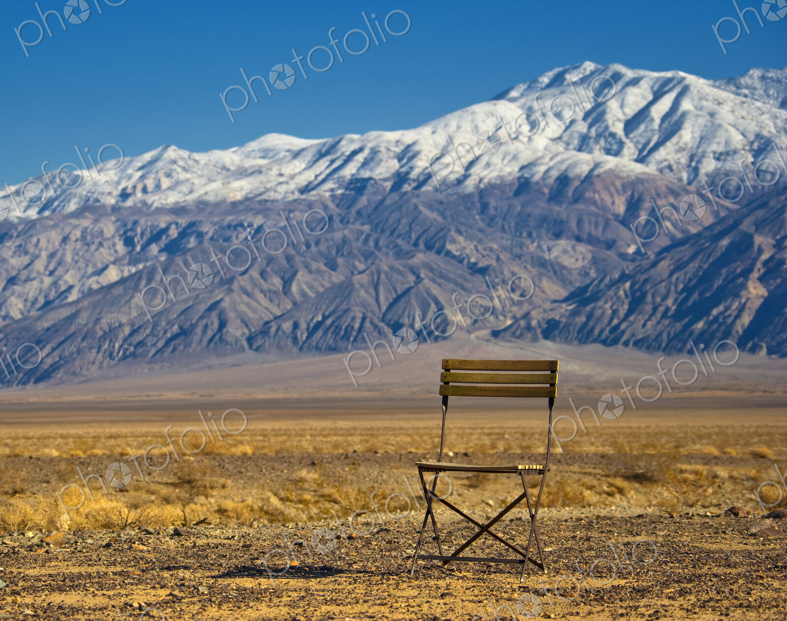 Chair in Mountainous, Desert Landscape