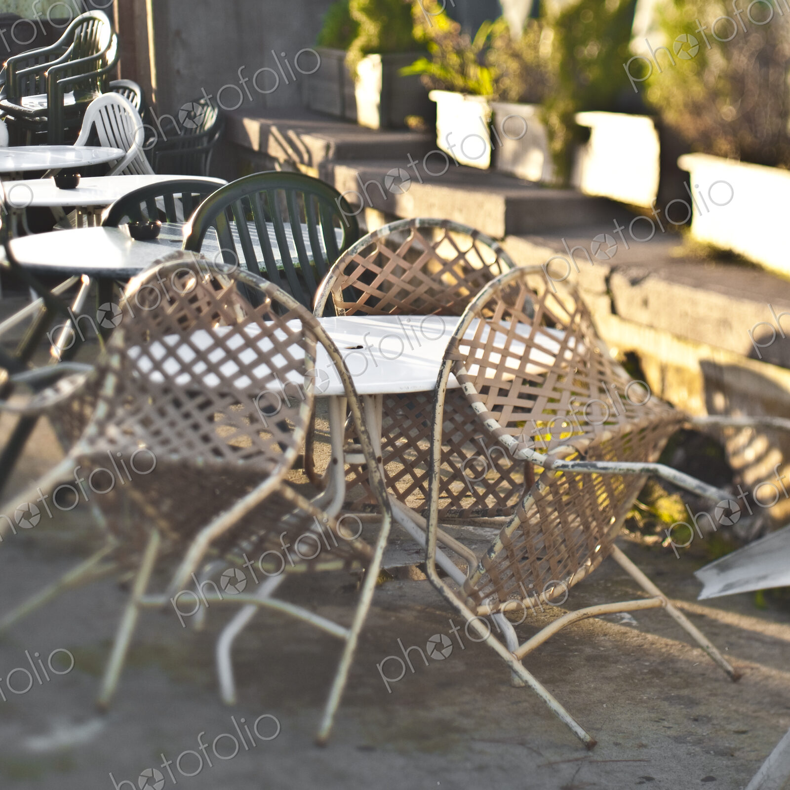 Chairs Leaning Up Against a Table