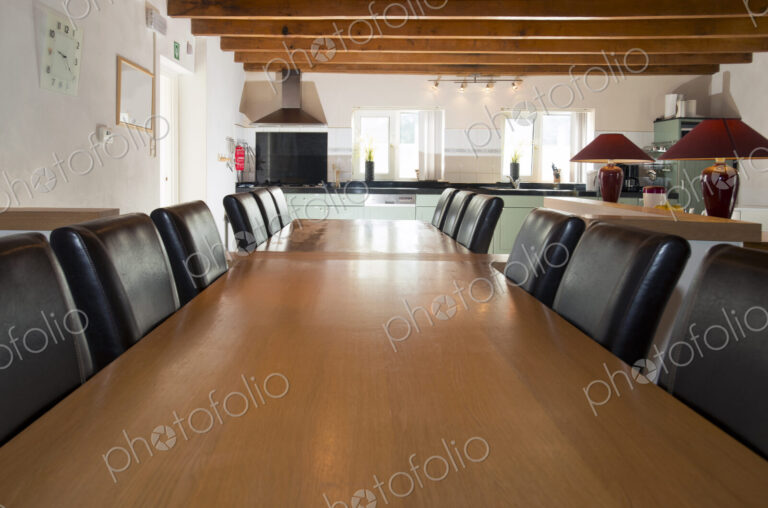 Chairs at empty dining tables