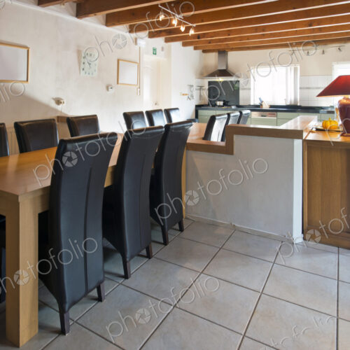 Chairs at empty kitchen table Chairs at empty kitchen table