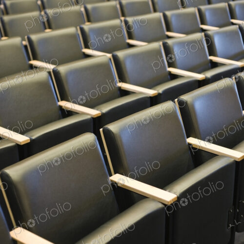 Chairs in a conference room or lecture theatre. Chairs in a conference room or lecture theatre.