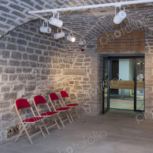Chairs in a vaulted stone room for lectures meetings or seminars at a university Chairs in a vaulted stone room for lectures meetings or seminars at a university