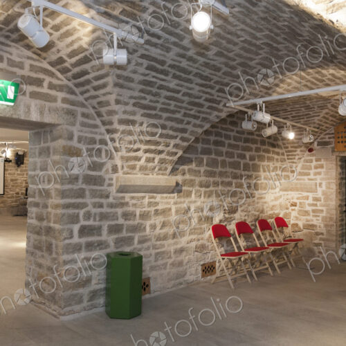 Chairs in a vaulted stone room for lectures meetings or seminars at a university Chairs in a vaulted stone room for lectures meetings or seminars at a university