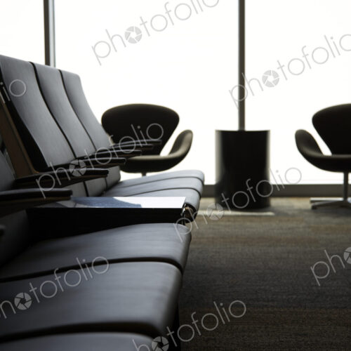 Chairs in airport waiting area Chairs in airport waiting area