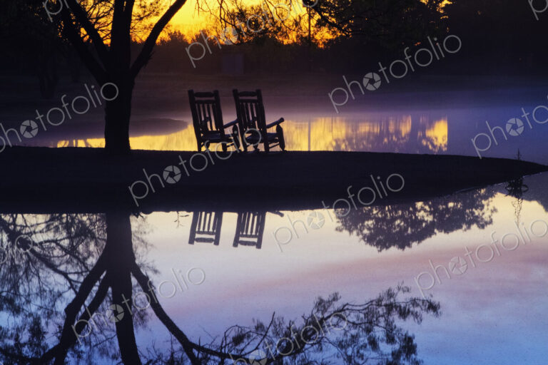 Chairs on a Beach at Sunset