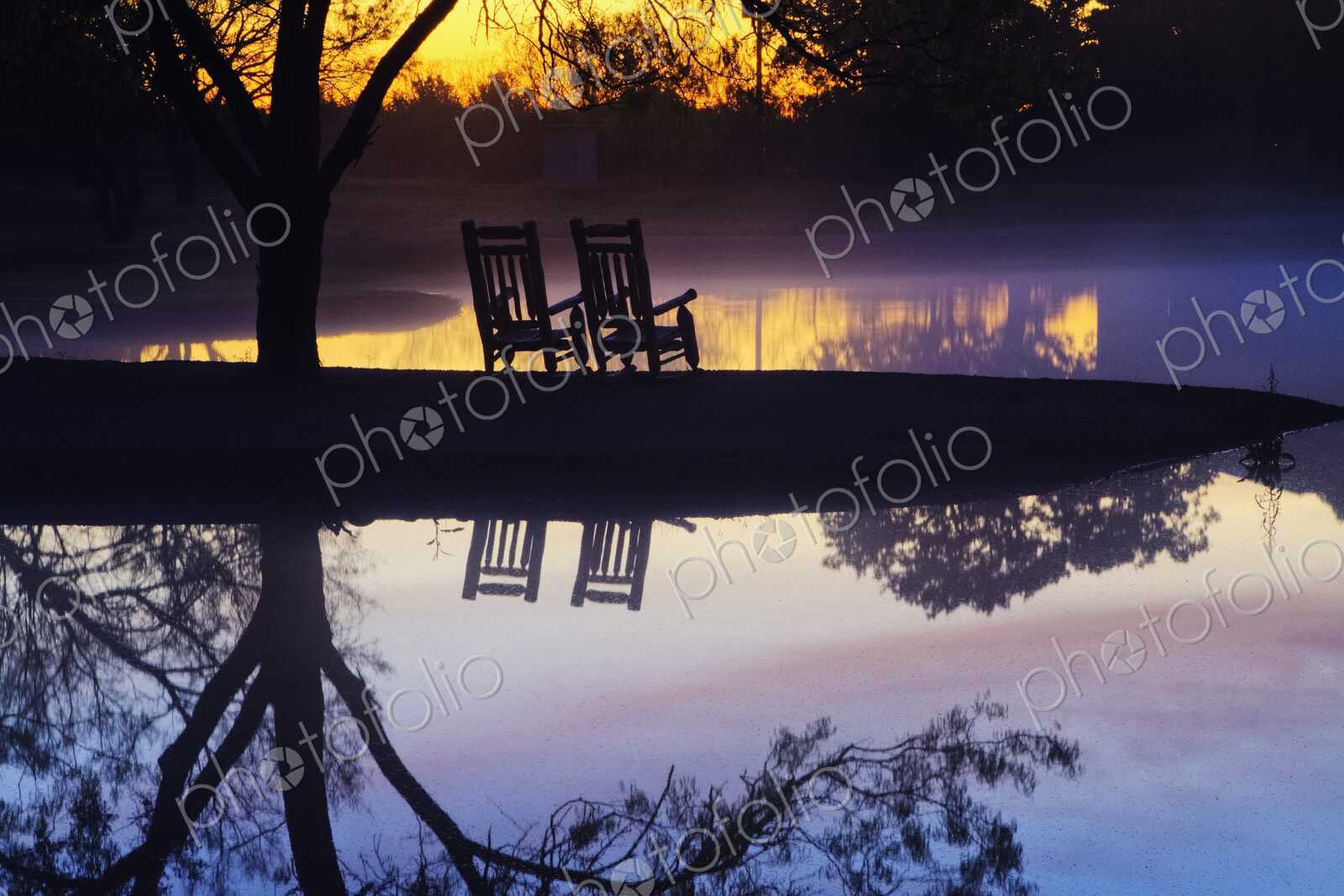 Chairs on a Beach at Sunset