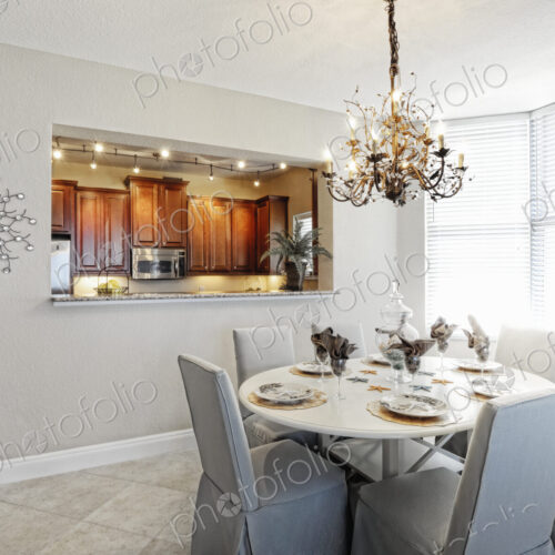 Chandelier over dining room table Chandelier over dining room table