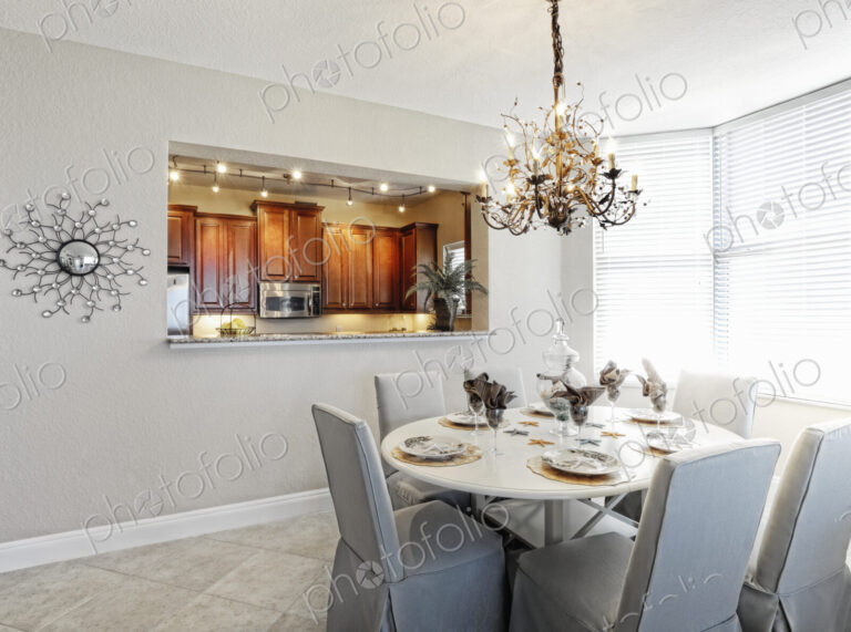 Chandelier over dining room table