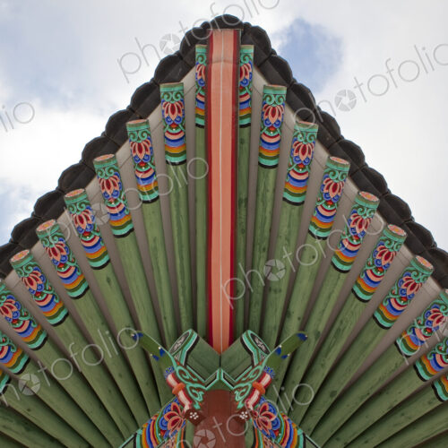 Changdeokgung Palace, low angle view of roof and decorative beams. Changdeokgung Palace, low angle view of roof and decorative beams.