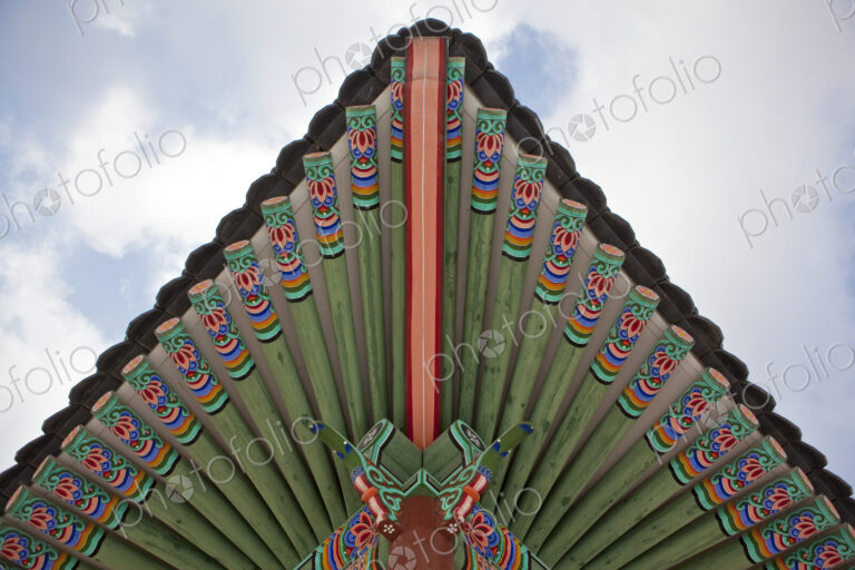 Changdeokgung Palace, low angle view of roof and decorative beams.