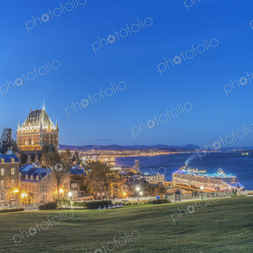 Chateau Frontenac, lit up at night in Quebec City, view over the St Lawrence river. Chateau Frontenac, lit up at night in Quebec City, view over the St Lawrence river.