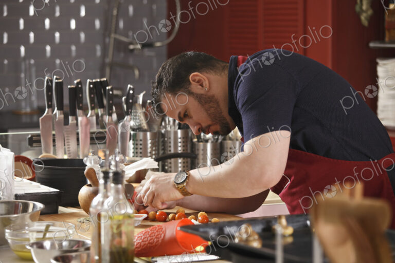 Chef cooking in commercial kitchen