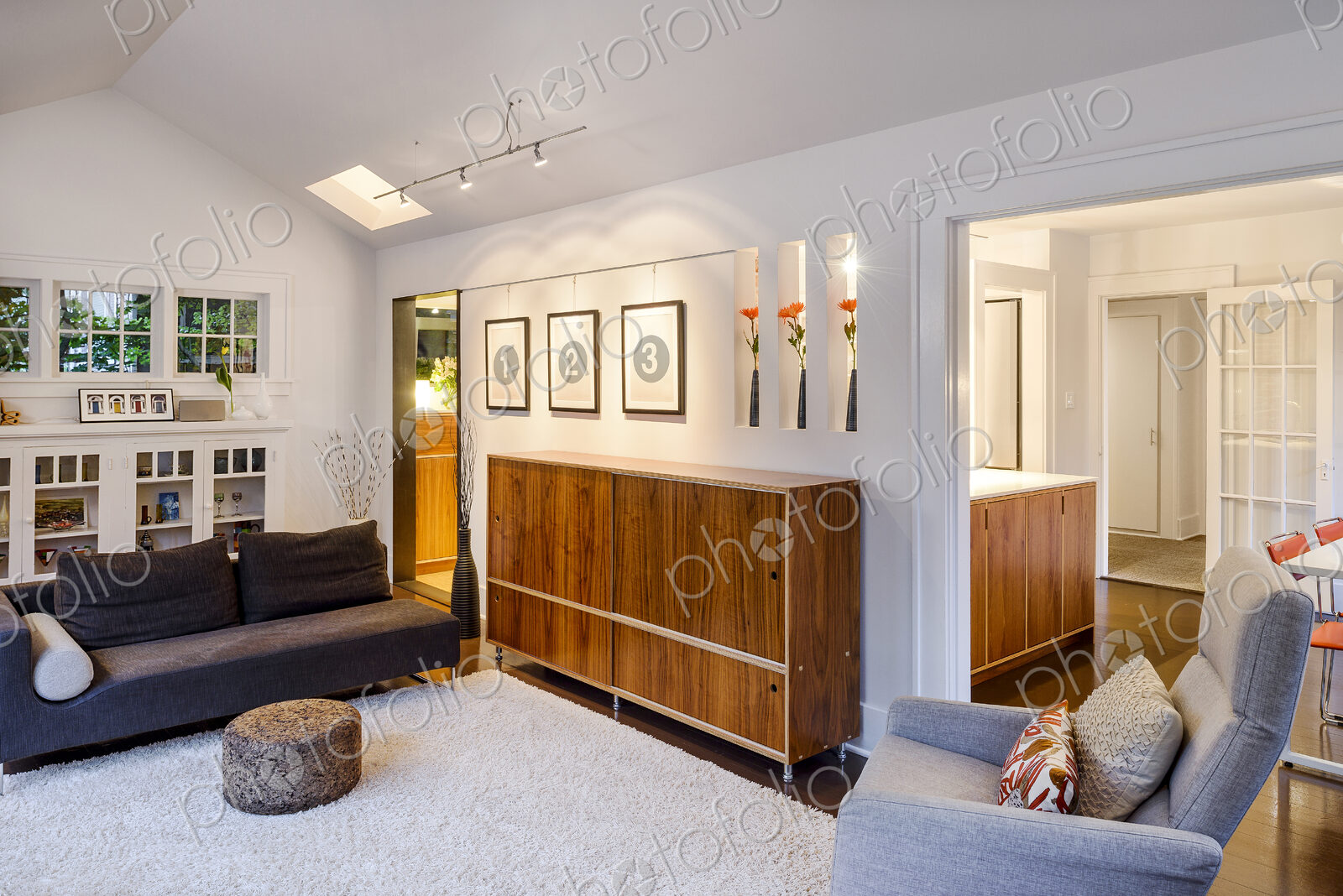 Chest, armchair and sofas in modern living room