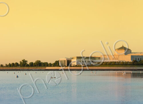 Chicago lake front and Museum Campus at sunset, a glow in thy sky, large public… Chicago lake front and Museum Campus at sunset, a glow in thy sky, large public…