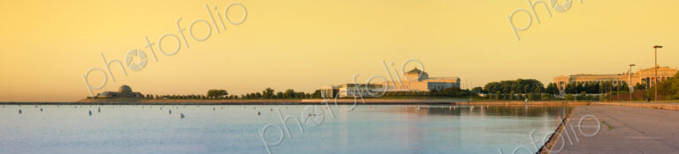 Chicago lake front and Museum Campus at sunset, a glow in thy sky, large public…