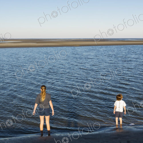 Children looking at ocean
