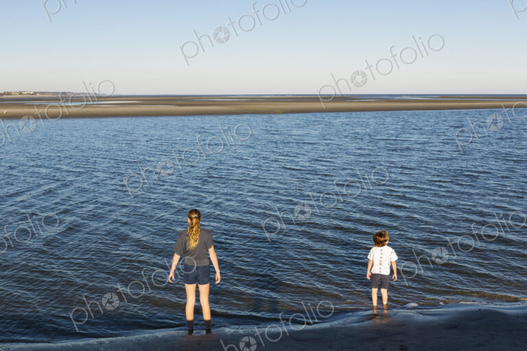 Children looking at ocean